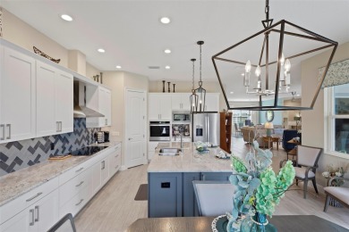 Welcome Home to this beautifully expanded Royal Palm in the on Harbor Hills Country Club in Florida - for sale on GolfHomes.com, golf home, golf lot