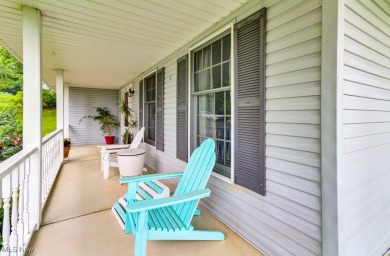 Welcome to this beautifully updated home nestled on a serene on Lake Mohawk Golf Club in Ohio - for sale on GolfHomes.com, golf home, golf lot