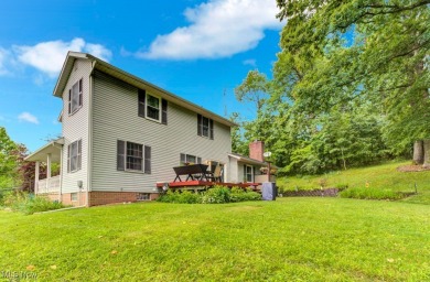 Welcome to this beautifully updated home nestled on a serene on Lake Mohawk Golf Club in Ohio - for sale on GolfHomes.com, golf home, golf lot