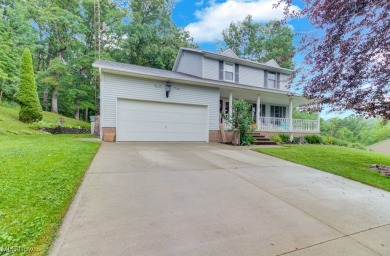 Welcome to this beautifully updated home nestled on a serene on Lake Mohawk Golf Club in Ohio - for sale on GolfHomes.com, golf home, golf lot