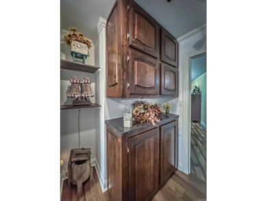 This beautifully updated and meticulously maintained golf course on Magellan Golf Course in Arkansas - for sale on GolfHomes.com, golf home, golf lot