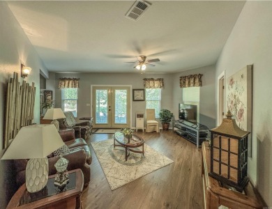 This beautifully updated and meticulously maintained golf course on Magellan Golf Course in Arkansas - for sale on GolfHomes.com, golf home, golf lot