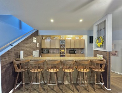 This beautifully updated and meticulously maintained golf course on Magellan Golf Course in Arkansas - for sale on GolfHomes.com, golf home, golf lot
