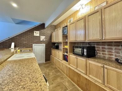 This beautifully updated and meticulously maintained golf course on Magellan Golf Course in Arkansas - for sale on GolfHomes.com, golf home, golf lot
