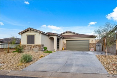 Welcome to your dream home in prestigious Laughlin Ranch golf on Laughlin Ranch Golf Club in Arizona - for sale on GolfHomes.com, golf home, golf lot