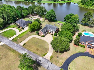 Welcome to your dream home on the tranquil shores of Lake Jenna on Tired Creek Golf Course in Georgia - for sale on GolfHomes.com, golf home, golf lot