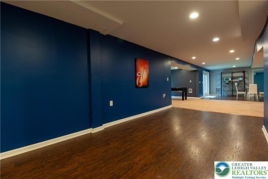 Stunning 6-bed, 4.5-bath brick-front Colonial nestled in on Caesars Pocono Palace Resort in Pennsylvania - for sale on GolfHomes.com, golf home, golf lot