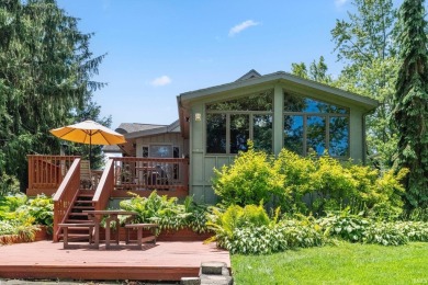 Beautiful lakefront log home located at Crooked Lake. This 4 on Crooked Lake Golf Course Whitley County in Indiana - for sale on GolfHomes.com, golf home, golf lot