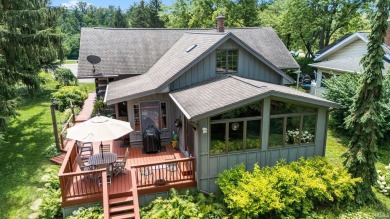 Beautiful lakefront log home located at Crooked Lake. This 4 on Crooked Lake Golf Course Whitley County in Indiana - for sale on GolfHomes.com, golf home, golf lot