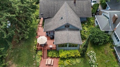 Beautiful lakefront log home located at Crooked Lake. This 4 on Crooked Lake Golf Course Whitley County in Indiana - for sale on GolfHomes.com, golf home, golf lot