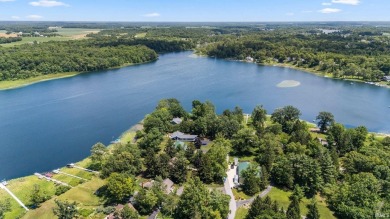 Beautiful lakefront log home located at Crooked Lake. This 4 on Crooked Lake Golf Course Whitley County in Indiana - for sale on GolfHomes.com, golf home, golf lot