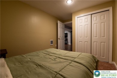 Stunning 6-bed, 4.5-bath brick-front Colonial nestled in on Caesars Pocono Palace Resort in Pennsylvania - for sale on GolfHomes.com, golf home, golf lot