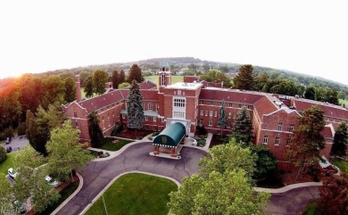 Stunning architecture and exquisite finishes designed by local on Glenmoor Country Club in Ohio - for sale on GolfHomes.com, golf home, golf lot