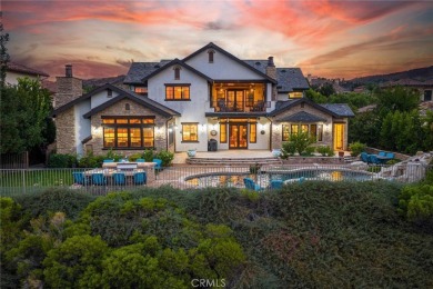 Among the rare custom Westridge Estates perched along the 18th on TPC At Valencia in California - for sale on GolfHomes.com, golf home, golf lot
