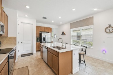 Better than new! This exquisitely maintained 2023 Salina model on Stonegate Golf Club in Florida - for sale on GolfHomes.com, golf home, golf lot