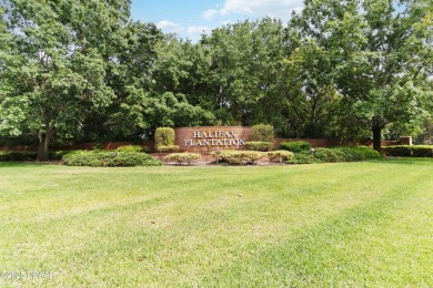Charming Halifax Plantation Home with Impressive Curb Appeal on Halifax Plantation Golf Club in Florida - for sale on GolfHomes.com, golf home, golf lot