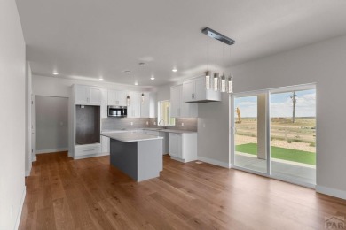 This beautiful new home offers a contemporary Luxury open floor on Walking Stick Golf Course in Colorado - for sale on GolfHomes.com, golf home, golf lot