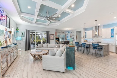 Breathtaking sunset views over a serene lake set the tone for on Verandah Golf Course and Club in Florida - for sale on GolfHomes.com, golf home, golf lot