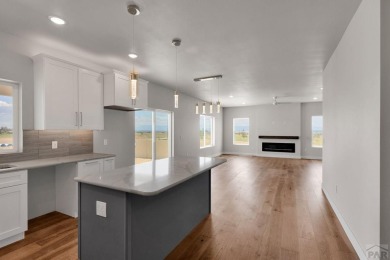 This beautiful new home offers a contemporary Luxury open floor on Walking Stick Golf Course in Colorado - for sale on GolfHomes.com, golf home, golf lot