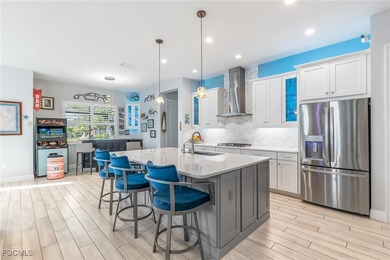 Breathtaking sunset views over a serene lake set the tone for on Verandah Golf Course and Club in Florida - for sale on GolfHomes.com, golf home, golf lot