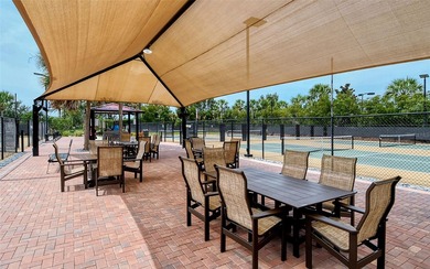 Under contract-accepting backup offers. Beautifully positioned on Esplanade Golf and Country at Lakewood Ranch in Florida - for sale on GolfHomes.com, golf home, golf lot