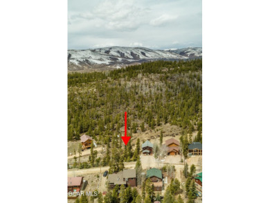 Amazing lot backing to HOA property in a quiet glen.  Treed and on Grand Lake Golf Course in Colorado - for sale on GolfHomes.com, golf home, golf lot