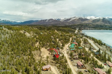 Amazing lot backing to HOA property in a quiet glen.  Treed and on Grand Lake Golf Course in Colorado - for sale on GolfHomes.com, golf home, golf lot