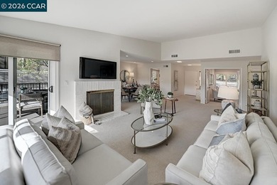 The minute you enter this charming home you are embraced by an on Rossmoor Golf Course in California - for sale on GolfHomes.com, golf home, golf lot