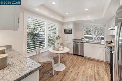 The minute you enter this charming home you are embraced by an on Rossmoor Golf Course in California - for sale on GolfHomes.com, golf home, golf lot