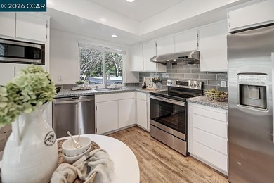 The minute you enter this charming home you are embraced by an on Rossmoor Golf Course in California - for sale on GolfHomes.com, golf home, golf lot