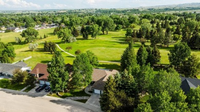 Enjoy the views of the 14th fairway of the Buffalo Golf Club on Buffalo Golf Club in Wyoming - for sale on GolfHomes.com, golf home, golf lot