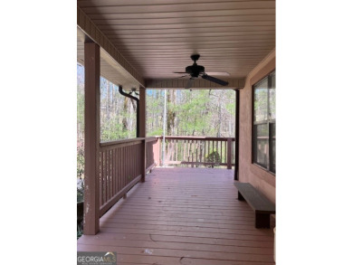 THIS CHARMING 3BR/3.5 BT HOME BOAST A PICURESQUE SETTING WITHIN on Innsbruck Resort and Golf Club in Georgia - for sale on GolfHomes.com, golf home, golf lot