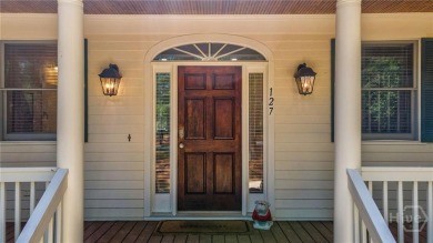 Discover the perfect blend of Southern charm and modern comfort on Great Waters Course At Reynolds Plantation in Georgia - for sale on GolfHomes.com, golf home, golf lot