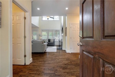 Discover the perfect blend of Southern charm and modern comfort on Great Waters Course At Reynolds Plantation in Georgia - for sale on GolfHomes.com, golf home, golf lot