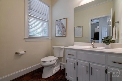 Discover the perfect blend of Southern charm and modern comfort on Great Waters Course At Reynolds Plantation in Georgia - for sale on GolfHomes.com, golf home, golf lot