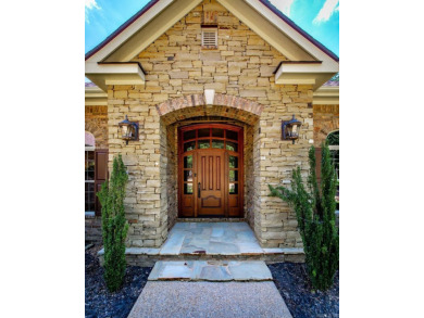 Experience the pinnacle of lakefront luxury in this furnished on  in Arkansas - for sale on GolfHomes.com, golf home, golf lot