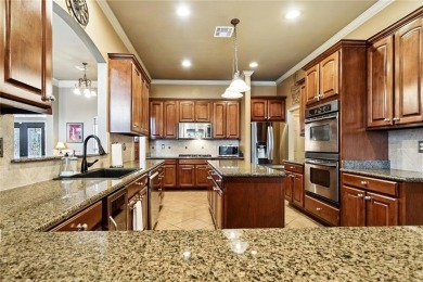 Beautiful 4-bedroom, 3-bath home located in the gated Masters on Oak Harbor Golf Club in Louisiana - for sale on GolfHomes.com, golf home, golf lot