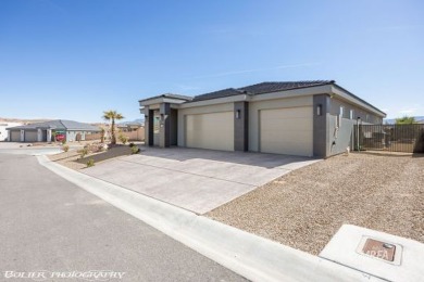 This exceptional one-level Cambria home is a true masterpiece on Wolf Creek At Paradise Canyon in Nevada - for sale on GolfHomes.com, golf home, golf lot