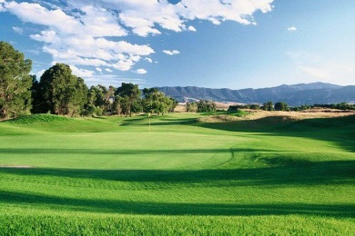This gorgeous homesite sits just above the Mountain Hole #8 at on The Powder Horn Golf Club - Mountain in Wyoming - for sale on GolfHomes.com, golf home, golf lot