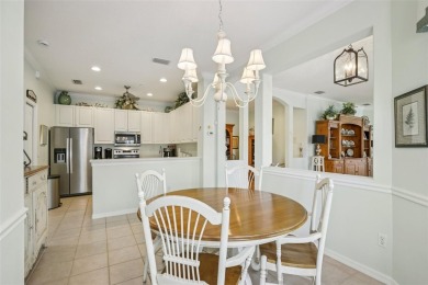 Meticulously maintained and lovingly cared for, rare end-unit on Pelican Pointe Golf and Country Club in Florida - for sale on GolfHomes.com, golf home, golf lot