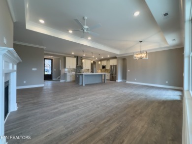 This home features a functional and open floor plan that on Tennessee National Golf Club in Tennessee - for sale on GolfHomes.com, golf home, golf lot