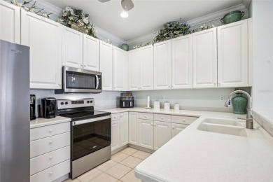 Meticulously maintained and lovingly cared for, rare end-unit on Pelican Pointe Golf and Country Club in Florida - for sale on GolfHomes.com, golf home, golf lot