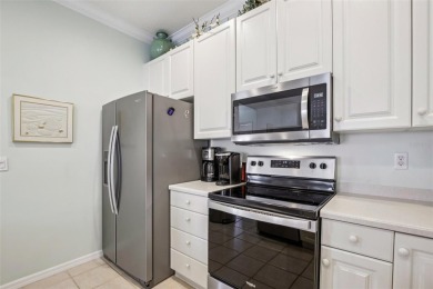 Meticulously maintained and lovingly cared for, rare end-unit on Pelican Pointe Golf and Country Club in Florida - for sale on GolfHomes.com, golf home, golf lot