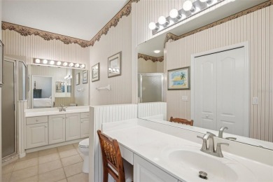 Meticulously maintained and lovingly cared for, rare end-unit on Pelican Pointe Golf and Country Club in Florida - for sale on GolfHomes.com, golf home, golf lot