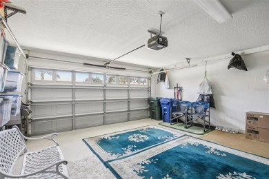 Meticulously maintained and lovingly cared for, rare end-unit on Pelican Pointe Golf and Country Club in Florida - for sale on GolfHomes.com, golf home, golf lot