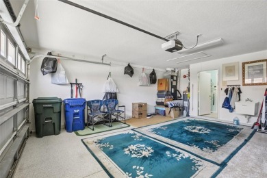 Meticulously maintained and lovingly cared for, rare end-unit on Pelican Pointe Golf and Country Club in Florida - for sale on GolfHomes.com, golf home, golf lot