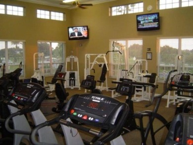 Meticulously maintained and lovingly cared for, rare end-unit on Pelican Pointe Golf and Country Club in Florida - for sale on GolfHomes.com, golf home, golf lot
