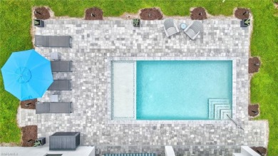 Experience modern Florida living at its finest in this stunning on Raptor Bay Golf Club in Florida - for sale on GolfHomes.com, golf home, golf lot