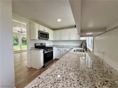Step into quiet luxury with this beautifully rebuilt 3-bedroom on Pine Lakes Golf Club in Ohio - for sale on GolfHomes.com, golf home, golf lot