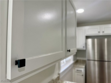 Step into quiet luxury with this beautifully rebuilt 3-bedroom on Pine Lakes Golf Club in Ohio - for sale on GolfHomes.com, golf home, golf lot